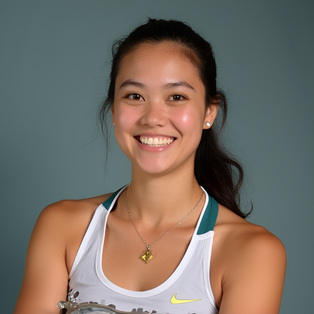 A portrait of Hannah Hidalgo smiling, perhaps holding an award or looking confidently towards the camera, conveying her personality and achievements off the court.